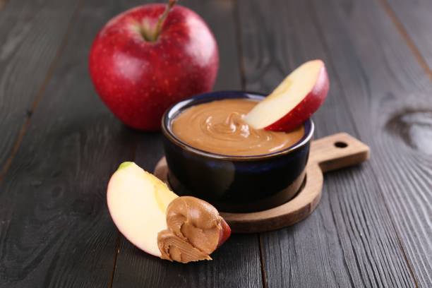 Apple with a Spoon of Peanut Butter: A Simple Snack That Saves Your Midday